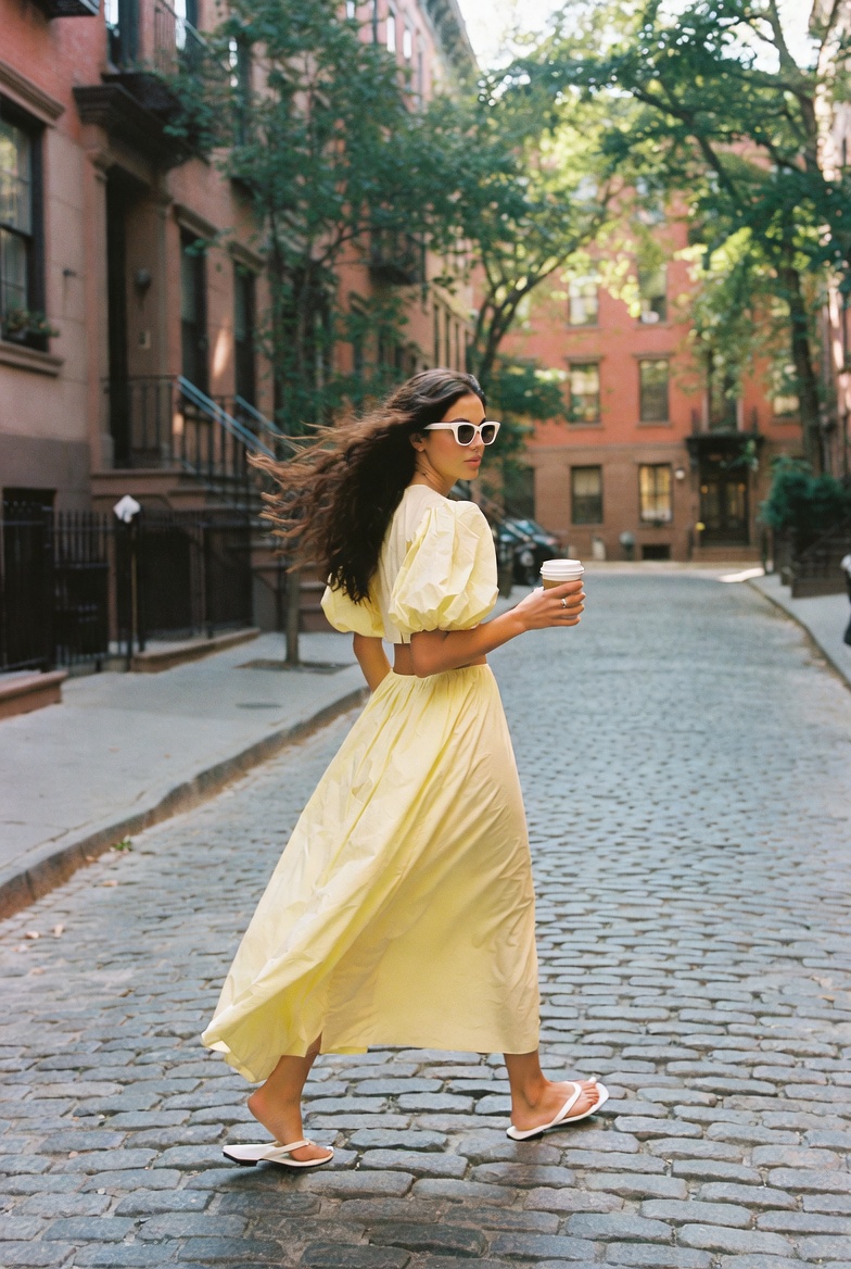 Butter Yellow — a woman in a tonal butter yellow skirt and blouse in Greenwich Village, ESVRA Most Wanted
